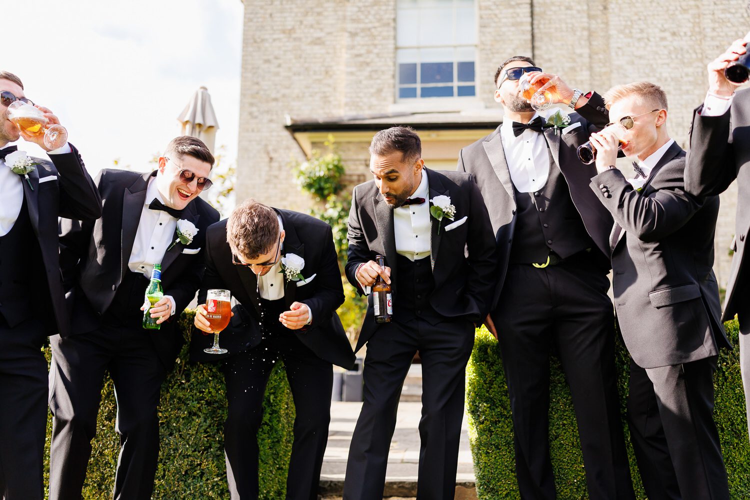 Groomsmen having a drink before Civil