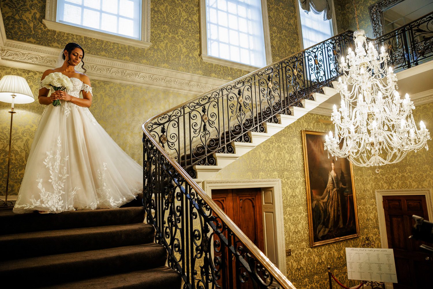 Hedsor house wedding bride walking down the stairs