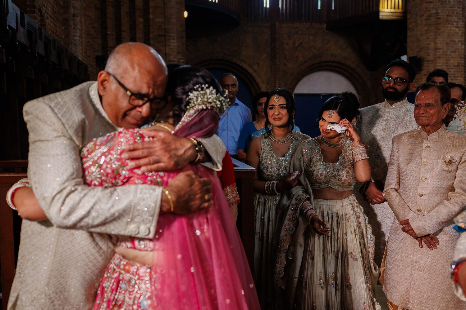 Emotional goodbye during Asian wedding