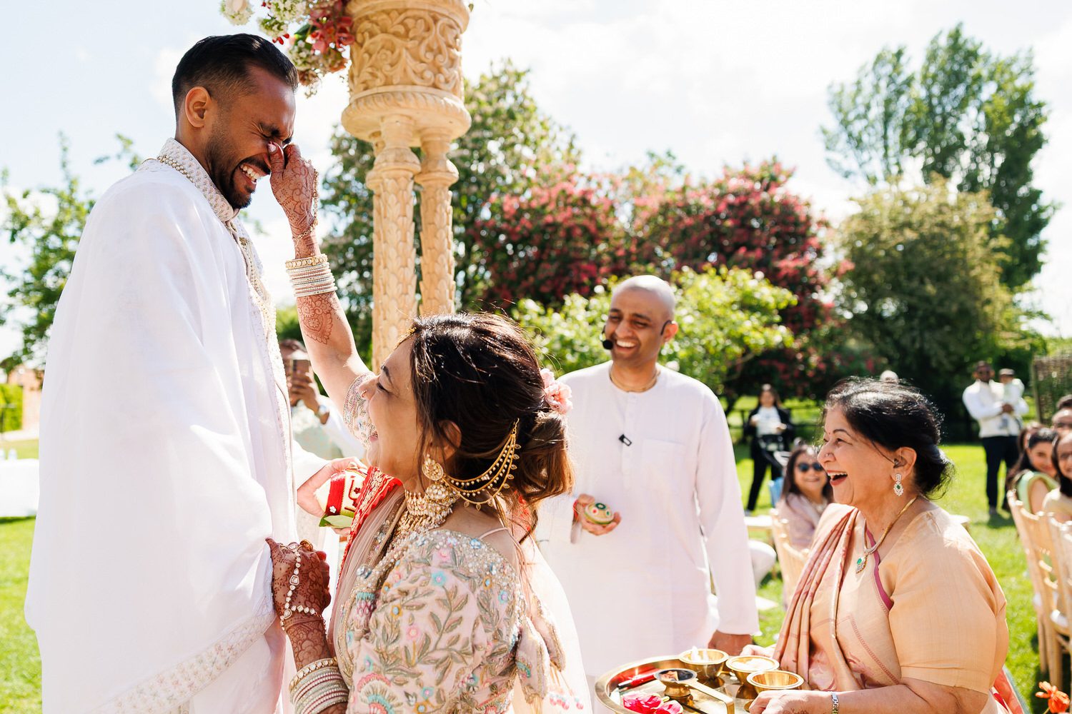 Indian wedding, groom's nose getting pinched