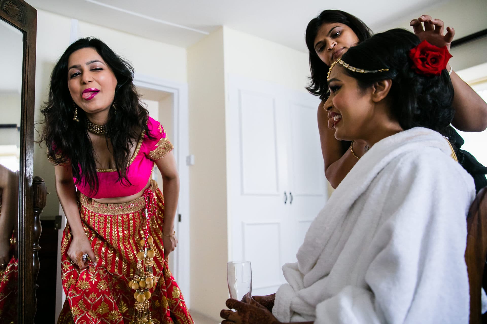 Asian Wedding Bridesmaid sticking tongue out