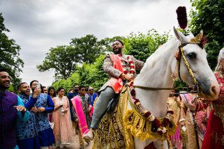 Asian Wedding groom arrival on horse