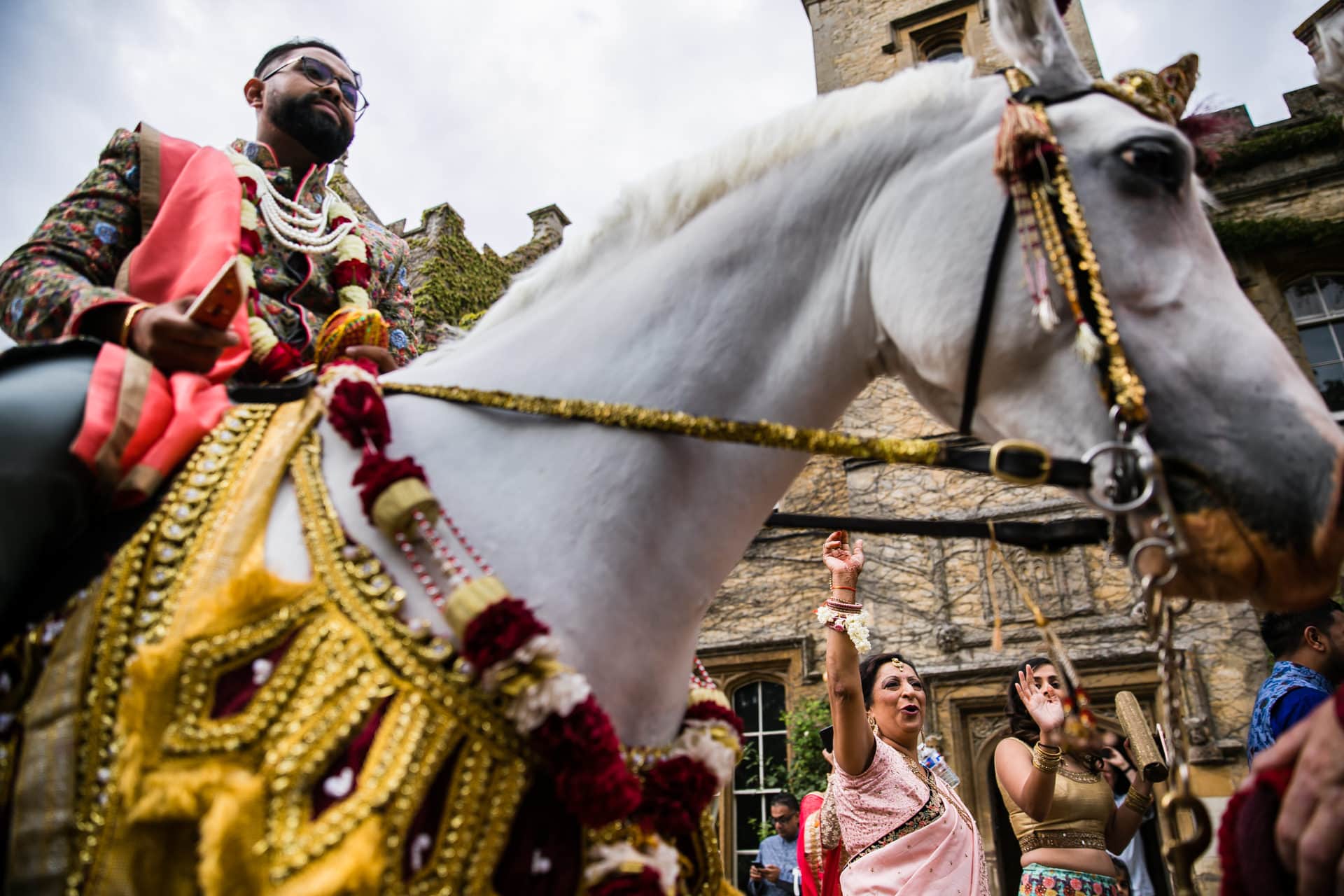 Asian Wedding groom arrival on horse