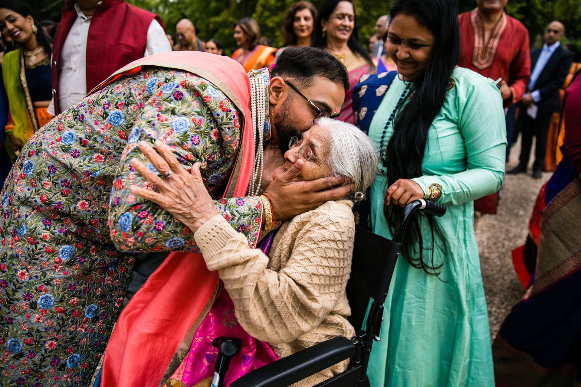 Groom kissing Gran on cheek