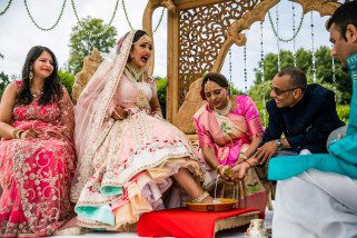 Feet washing ceremony during Gujarati wedding