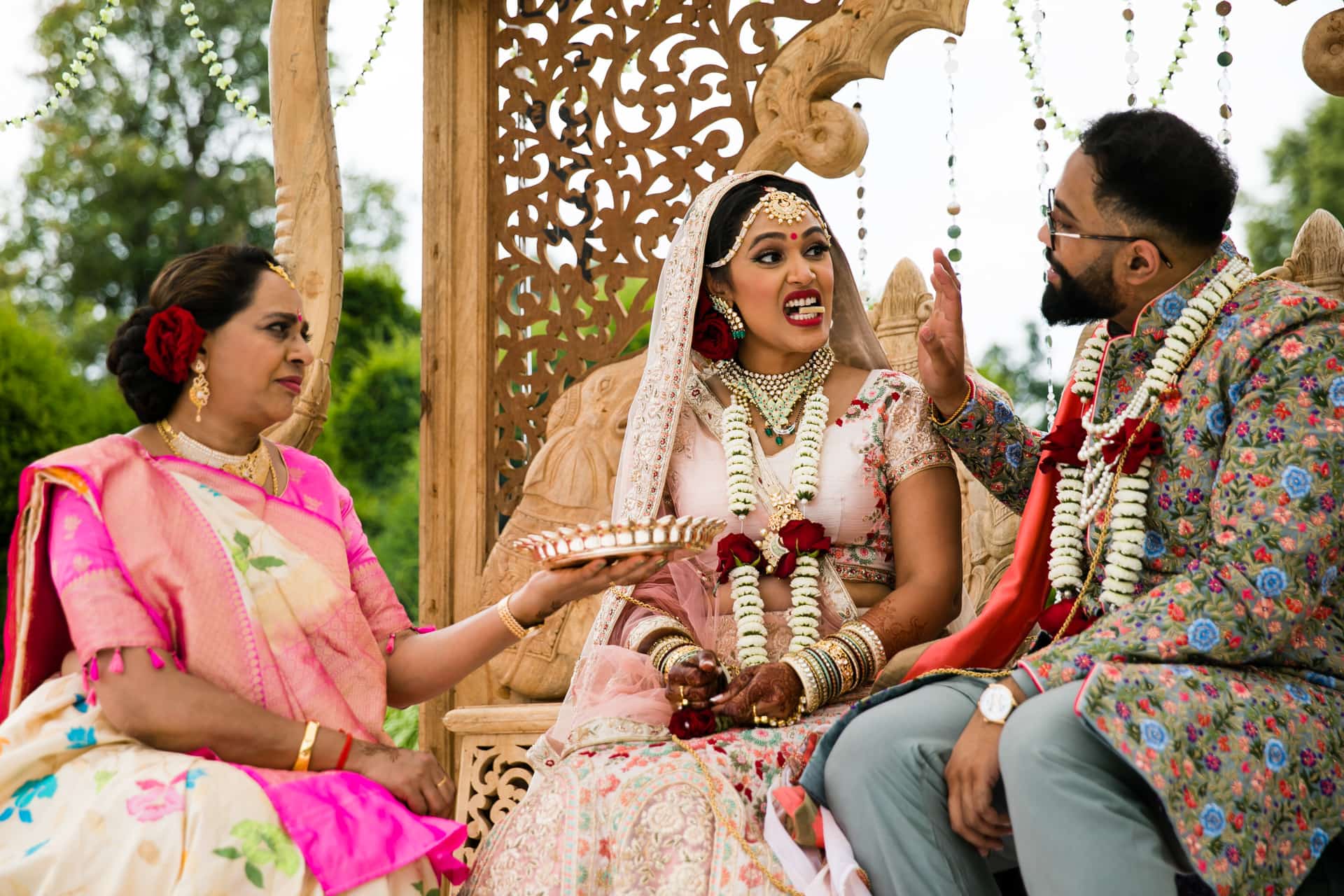 Groom feeding bride 