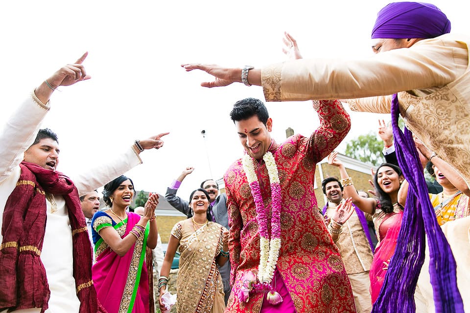 Asian Wedding groom dancing