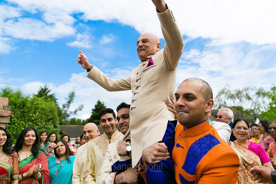 Father of the bride being lifted