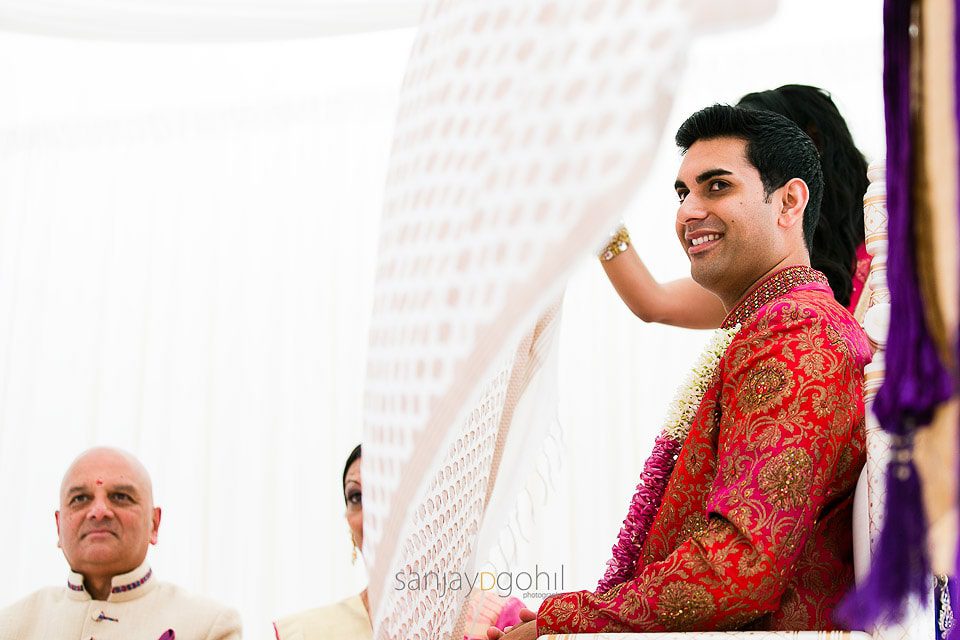 Asian wedding groom being the antarpath