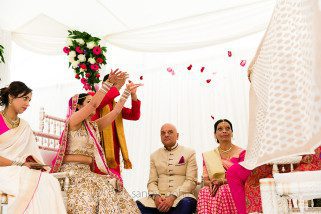 Bride throwing flowers