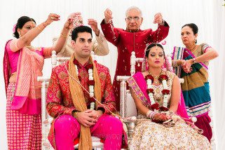 Hindu Wedding bride and groom being blessed by their parents