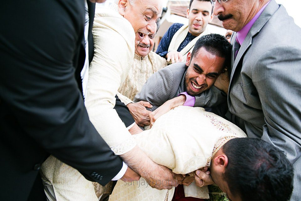 Groom's shoes being stolen