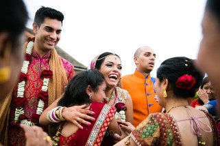 Bride hugging family members during vidhai ceremony