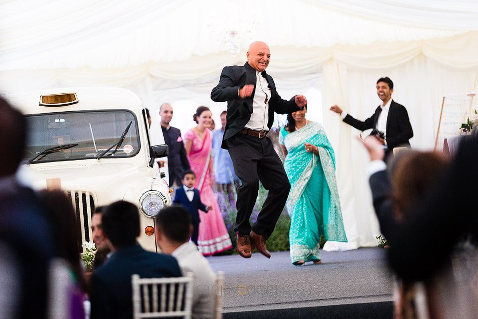 Father of the bride jumping