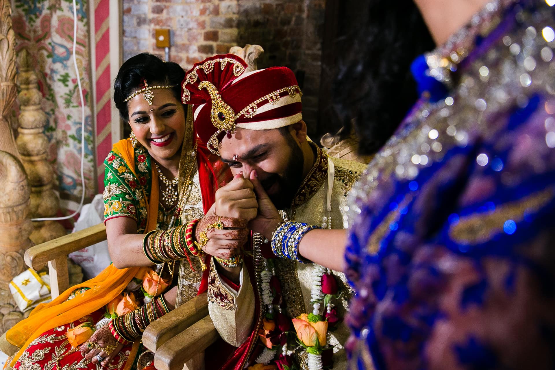 Groom's nose being pinched