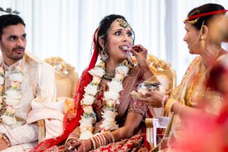 Bride being fed