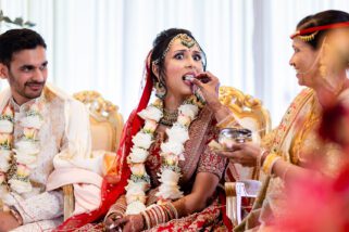 Bride being fed