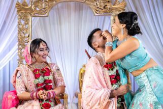 Groom getting his nose pinched