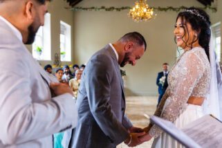 Bride and groom laughing during civil