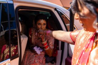 Bride kissing mother's hand