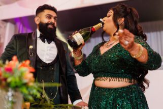 Bride and groom with Champagne