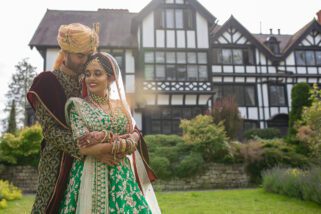 Asian bride and groom portrait at Bhaktivedanta Mandir, watford