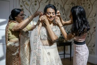 Bride getting ready for Civil wedding at Braxted Park