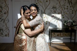 Bride hugging mum before Civil