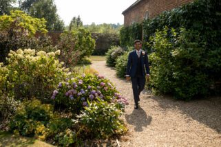 Groom walking to civil wedding