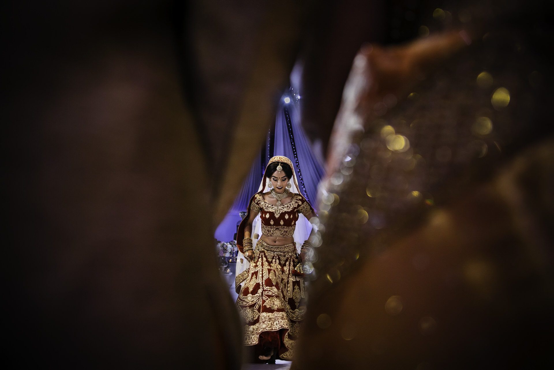 Indian Bride stepping into the mandap