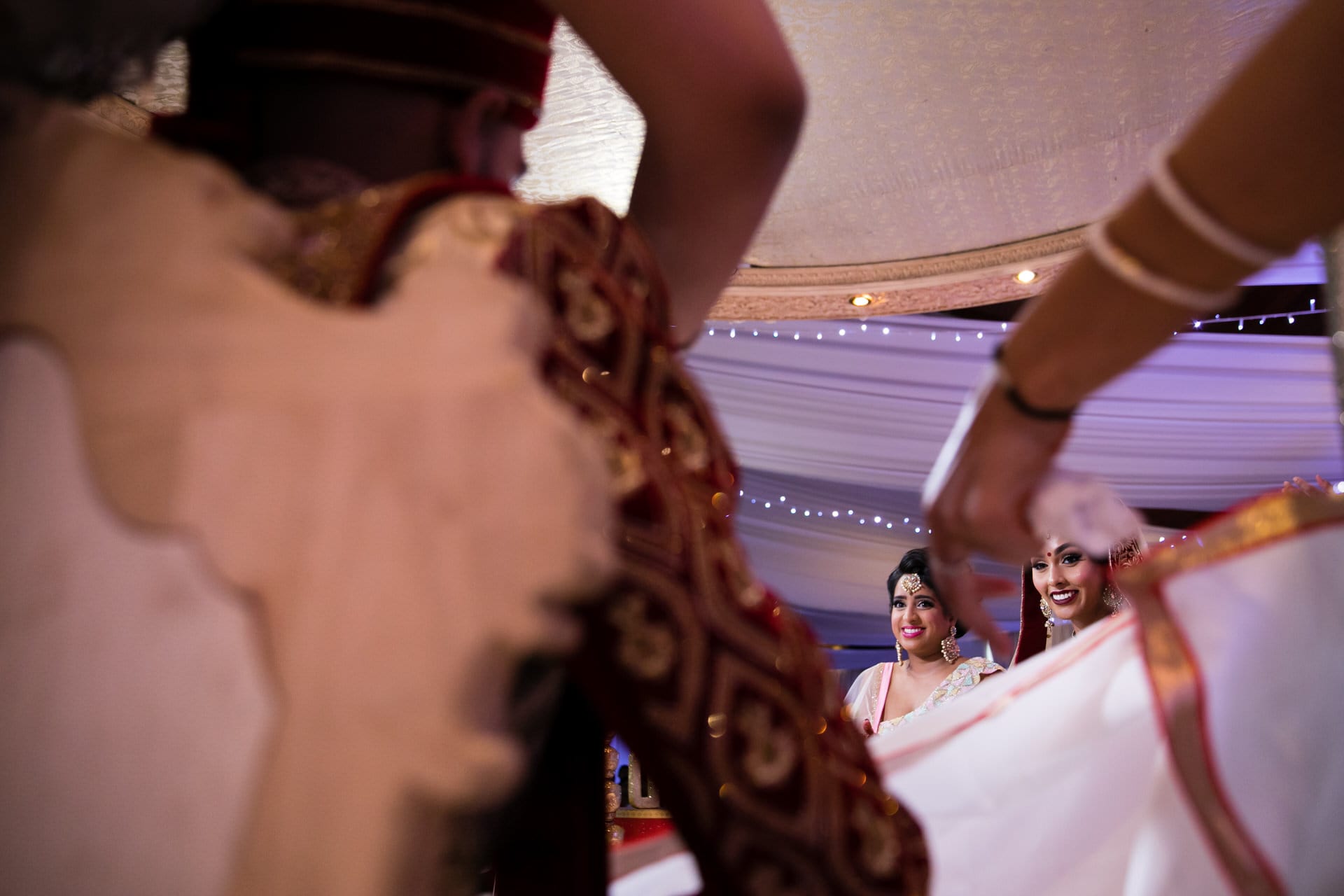 Brides's reaction to seeing groom during Hindu Wedding
