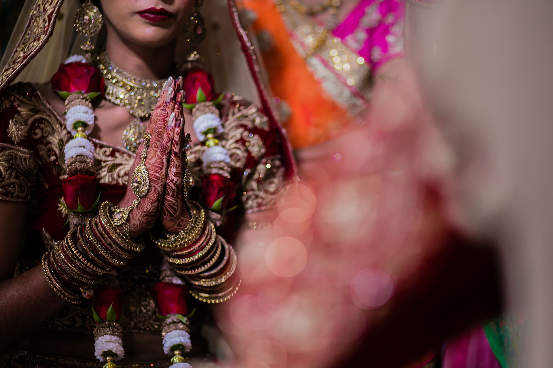 Bride's hands in prayer position