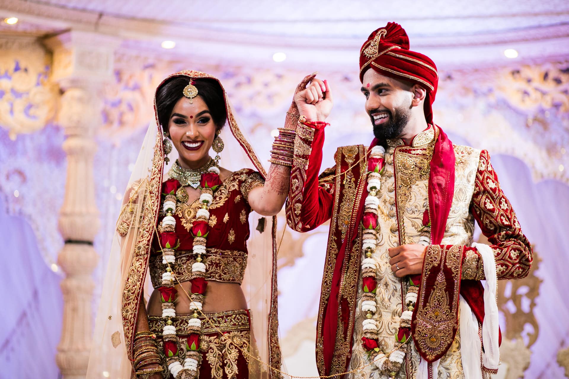 Bride and groom celebrating completion of wedding