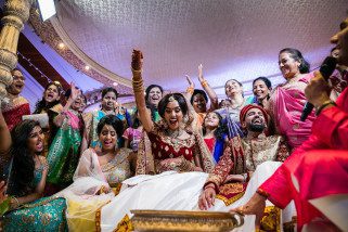 Indian bride and groom playing koda kodi