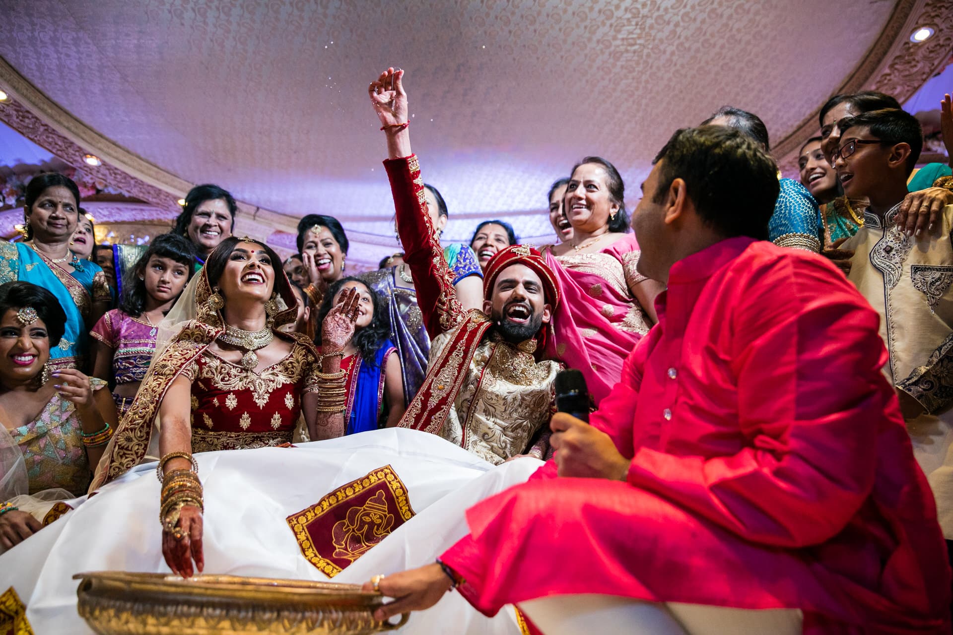 Indian bride and groom playing koda kodi