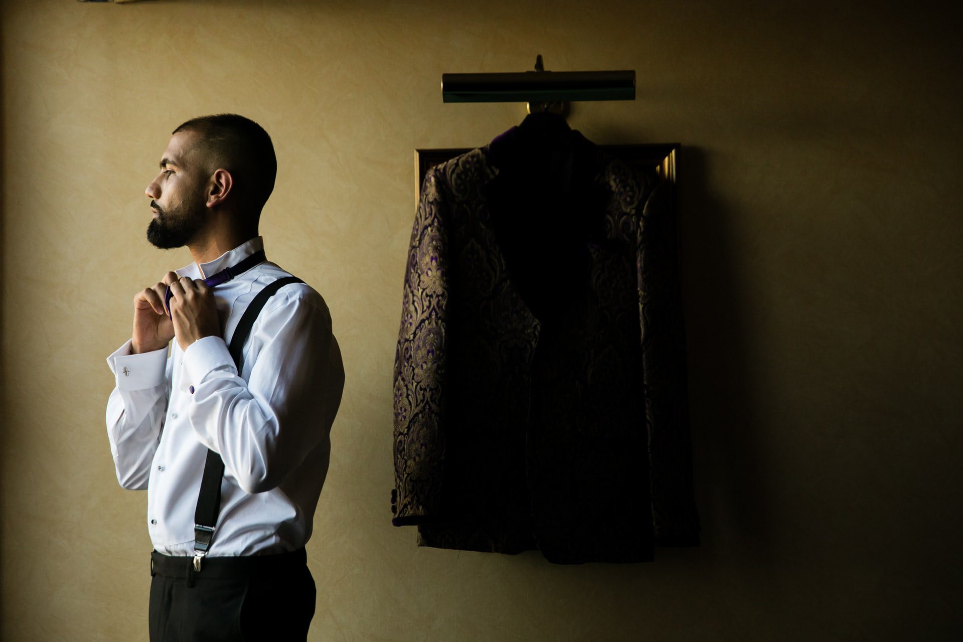 Asian Groom getting ready