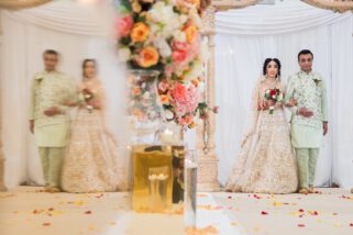 Hindu wedding bride walking into the mandap