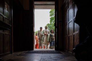 Wedding groom arriving at Froyle Park