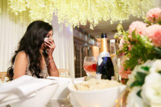 Emotional bride during reception party