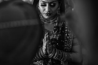 Bride with hands in Prayer position