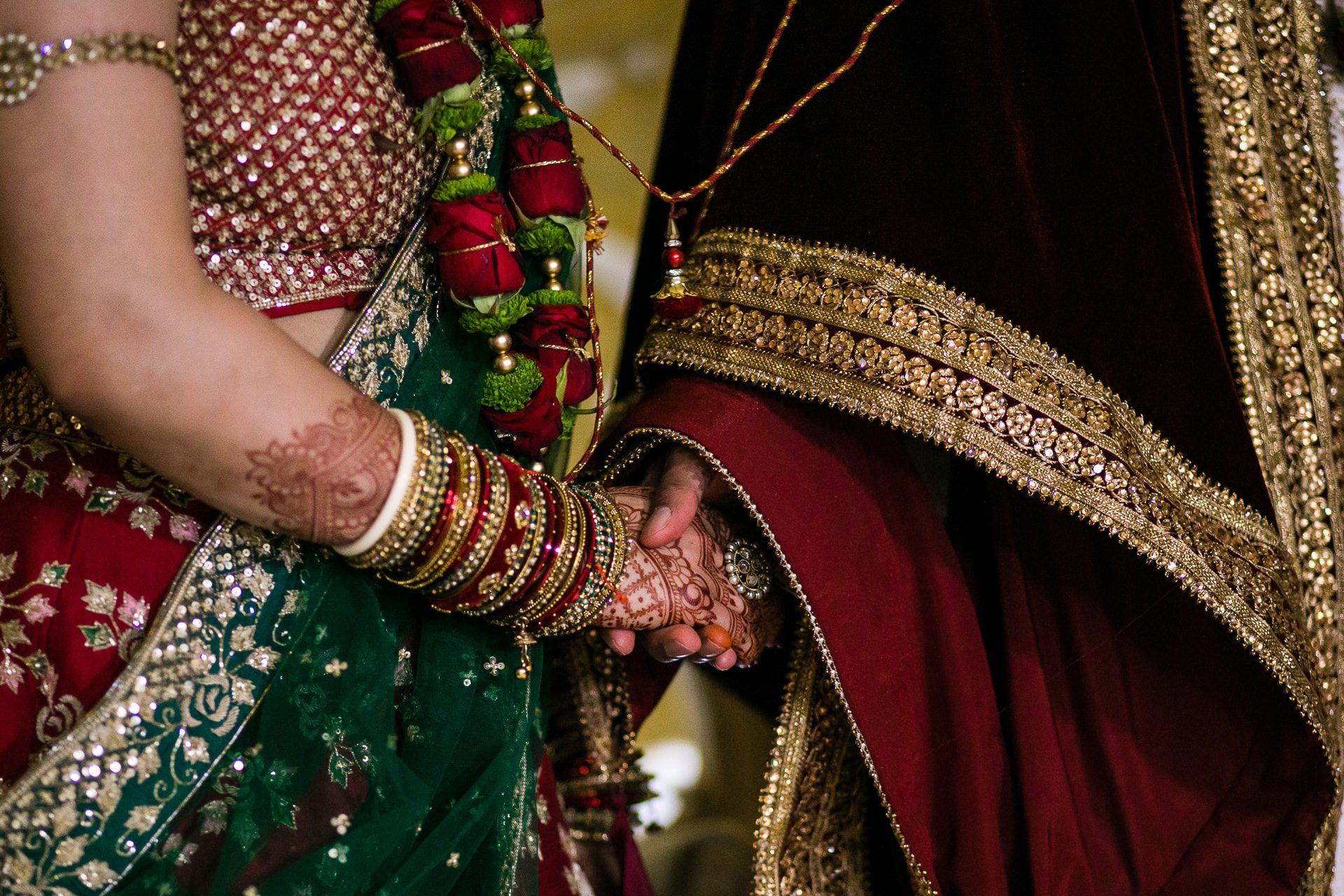 Bride and groom holding hands