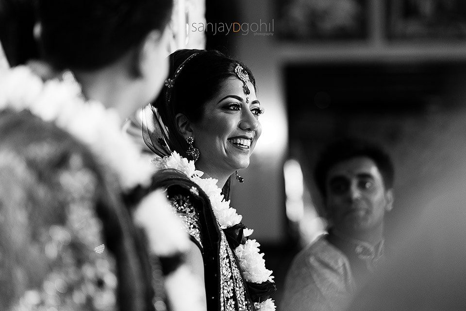 Asian wedding bride smiling