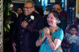 Parents of the groom laughing