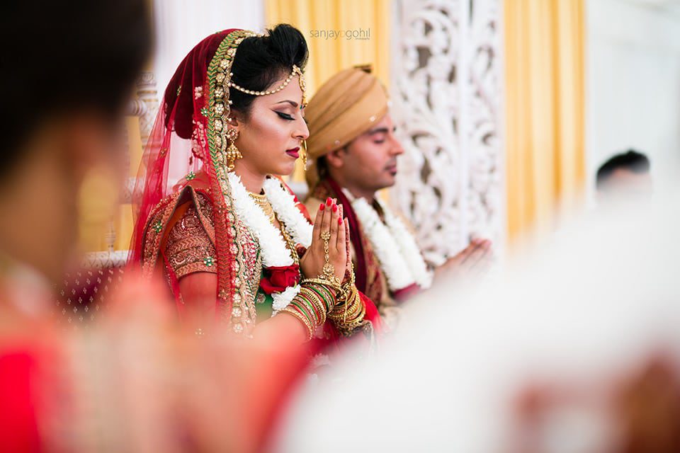 Hindu Wedding bride praying