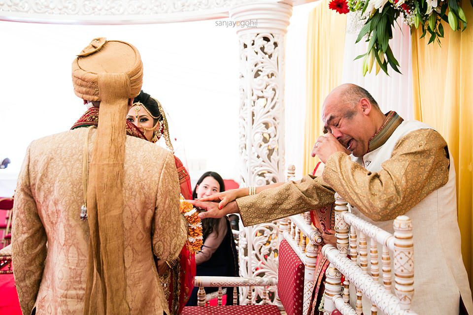 Father of the bride crying