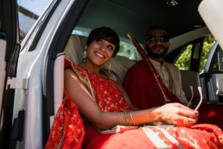 Groom inside wedding car