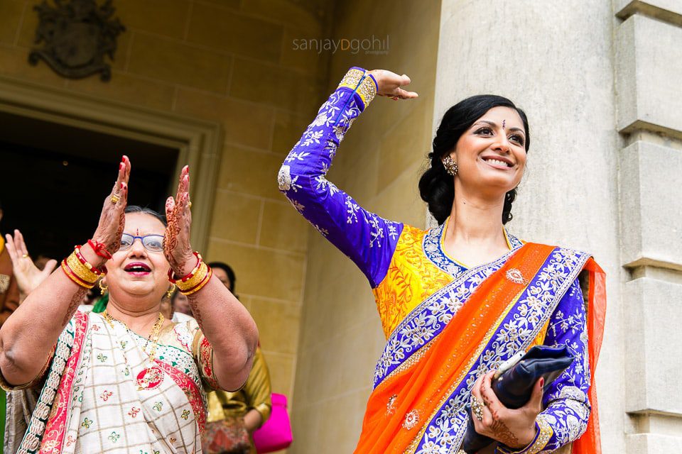 Sister and mother of bride dancing