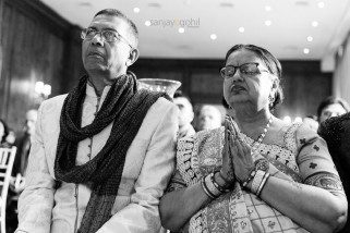 Parents of the bride praying