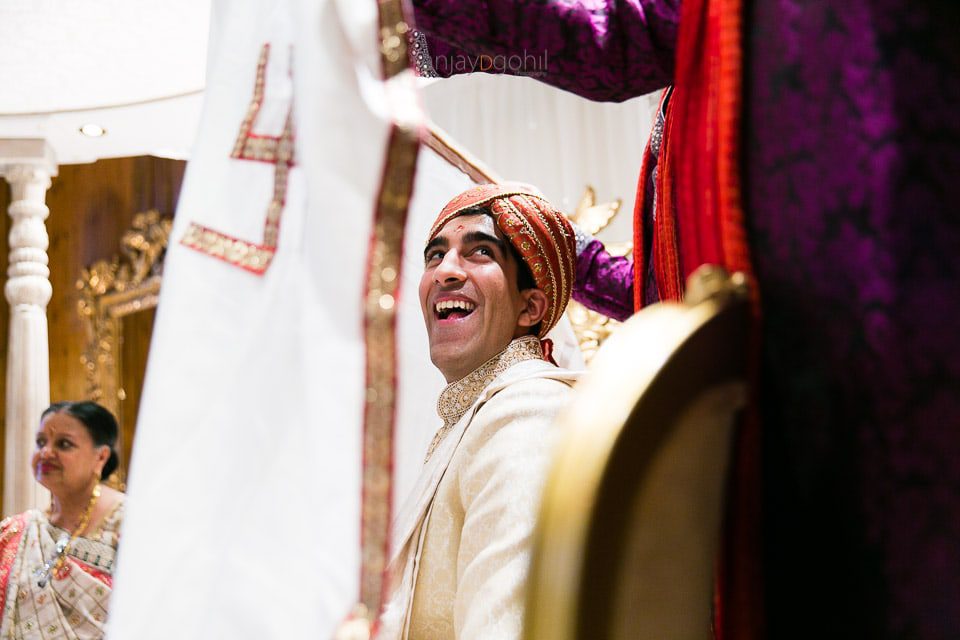 Wedding groom behind antaphat