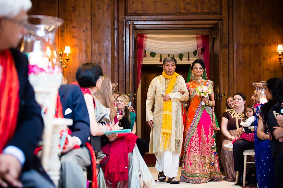 Asian wedding bride arriving